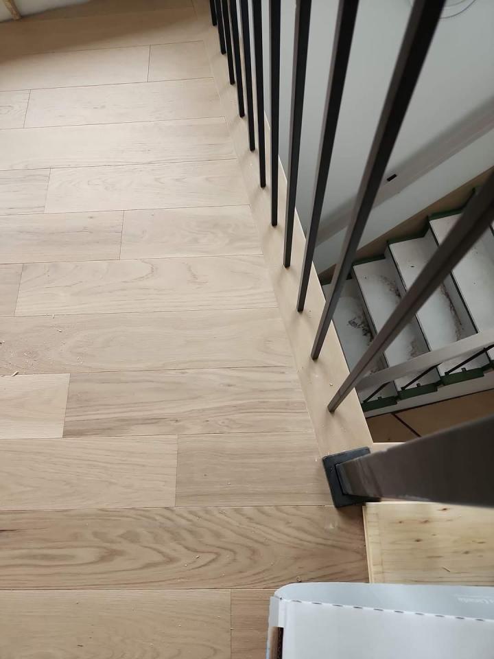 Installation de plancher bois franc Laval
